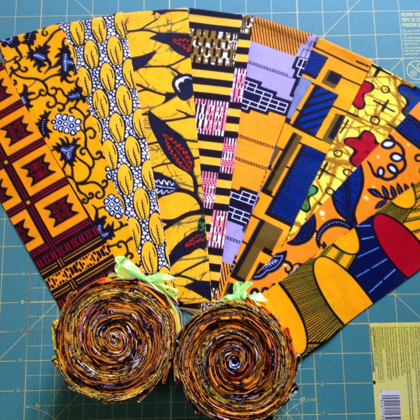 strips of yellow 2.5" quilt africa fabrics